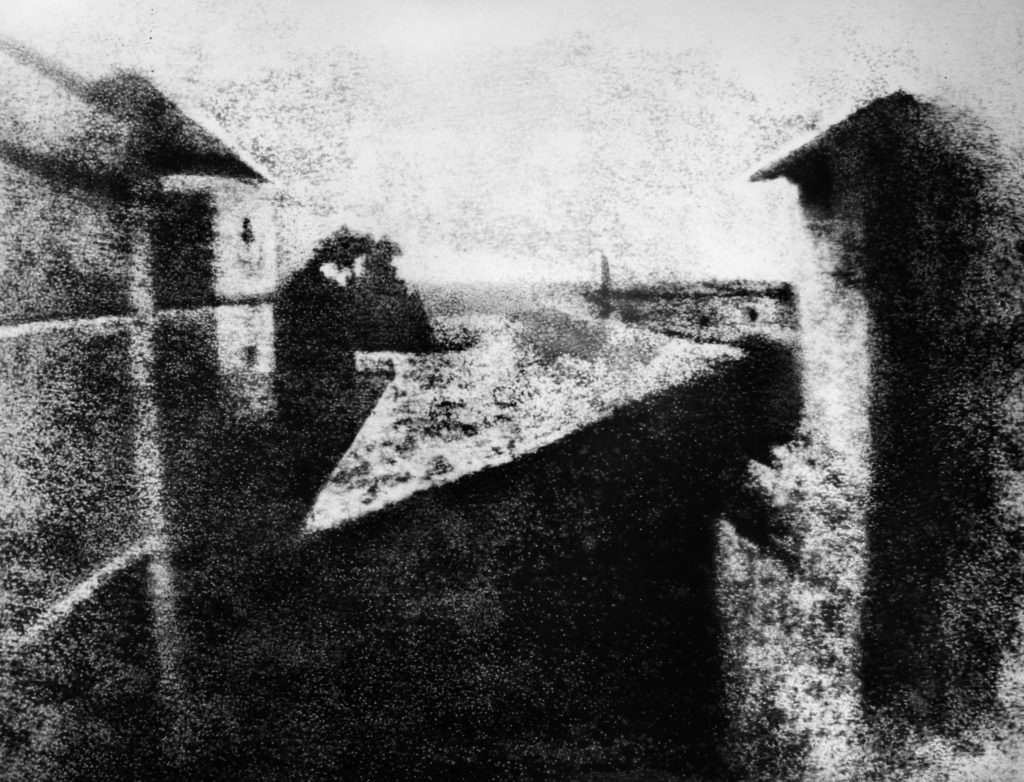  This is a reproduction of the first photograph ever taken by Joseph Nicéphore Niépce in 1826 or 1827, a view from the window at Le Gras.